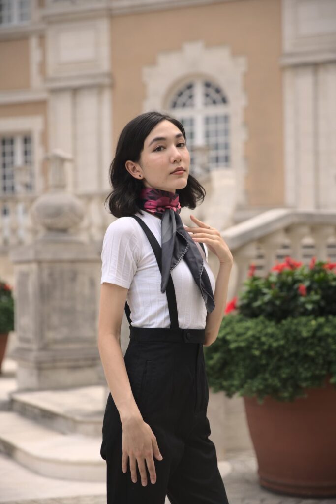 Georgia Risa wearing Retrospekt Flowering Gum scarf and pocket square.