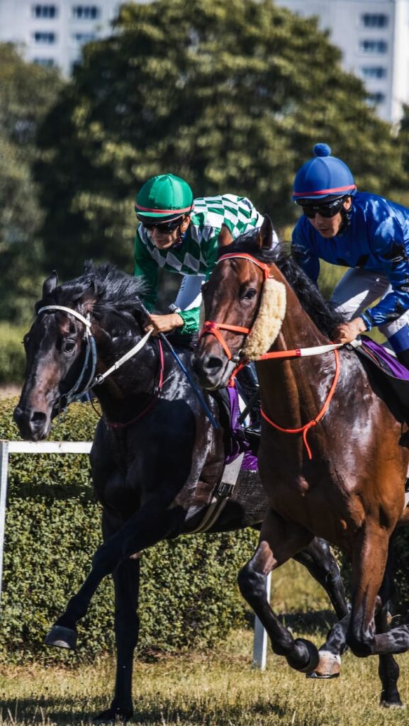 Jockeys horse racing at the Melbourne Cup.